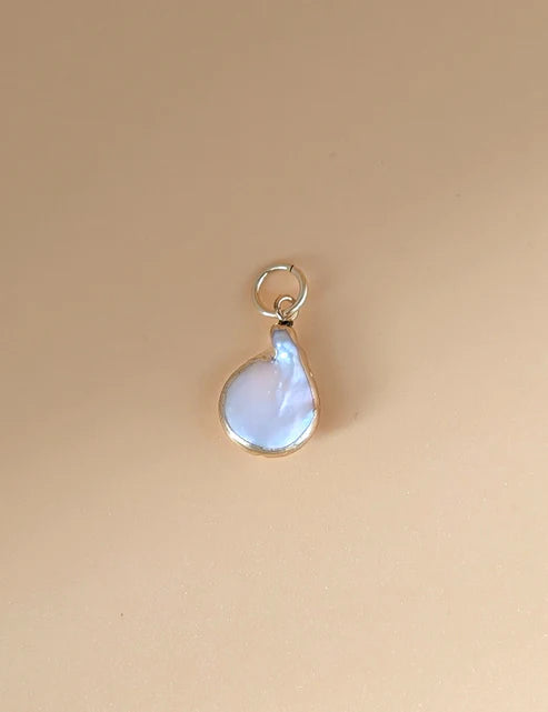 Nuance Gold Rim Pearl Charm
