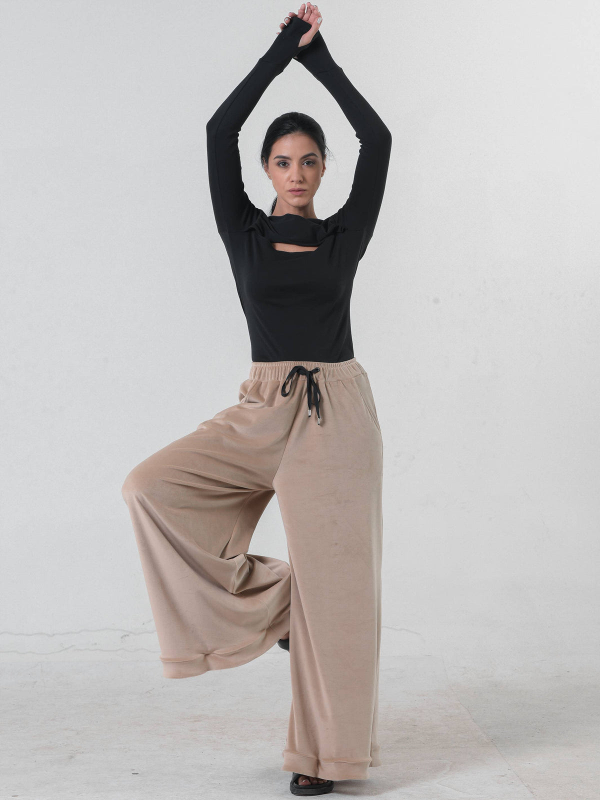 Metamorphoza Cut-out Long Sleeve Top