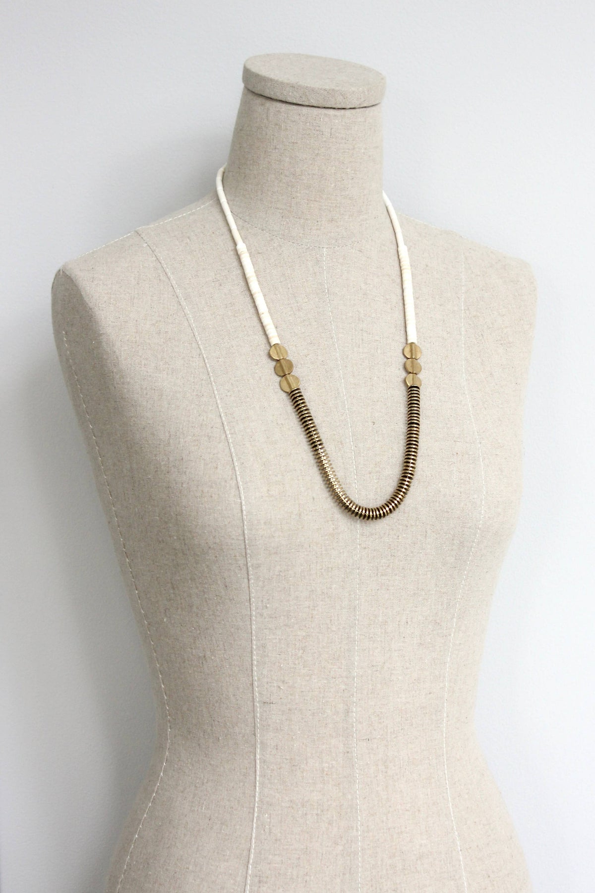 David Aubrey  Gold hematite and white disc necklace