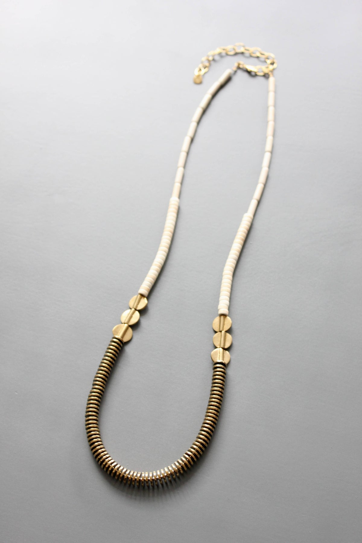 David Aubrey  Gold hematite and white disc necklace