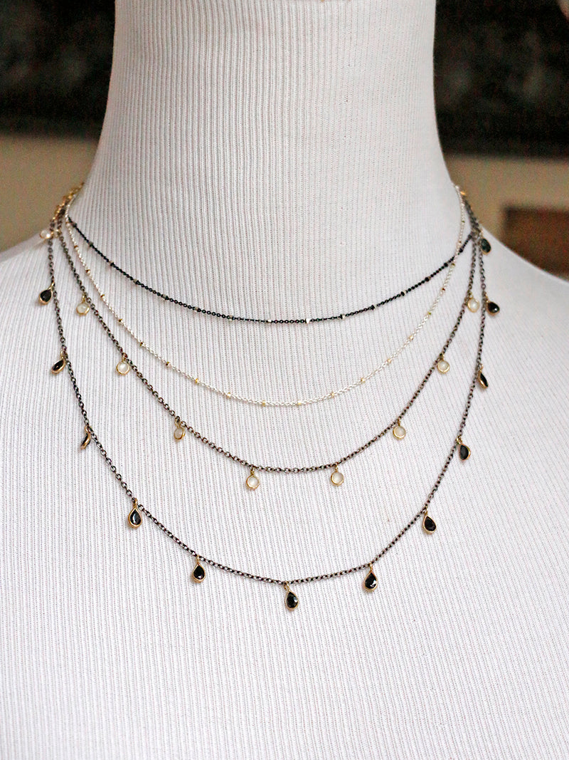 Susan Rifkin Moonstone Multi Charm Oxidized Silver Necklace